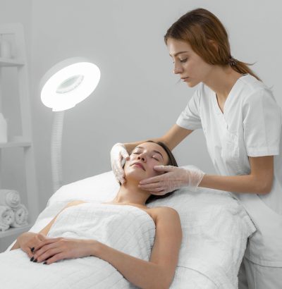 beautician-with-female-client-salon-face-care-routine